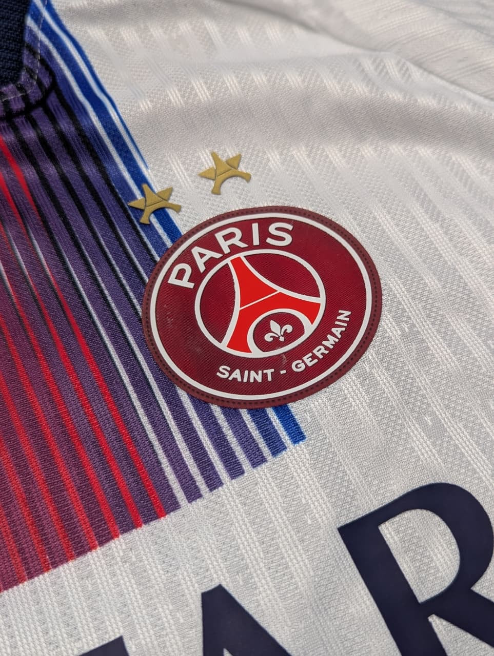 PSG Away 2026-27 white football jersey — red to navy gradient stripe, view 2